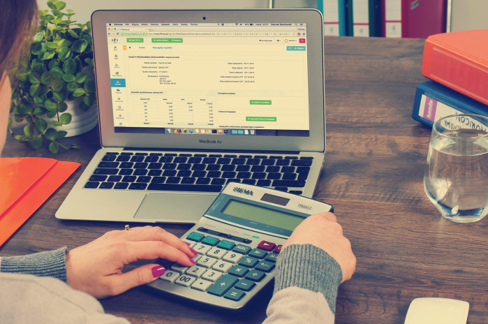 accounting desk laptop calculator